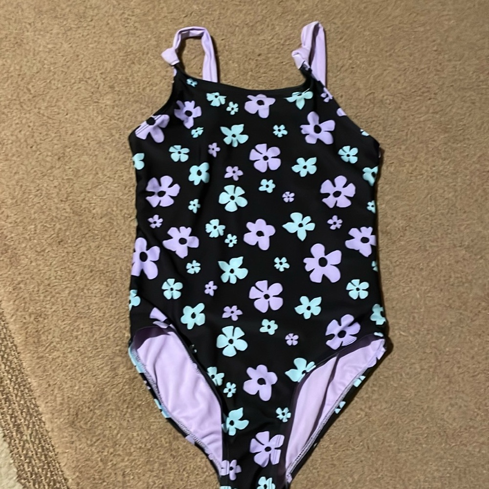 New never worn one piece girls bathing suit